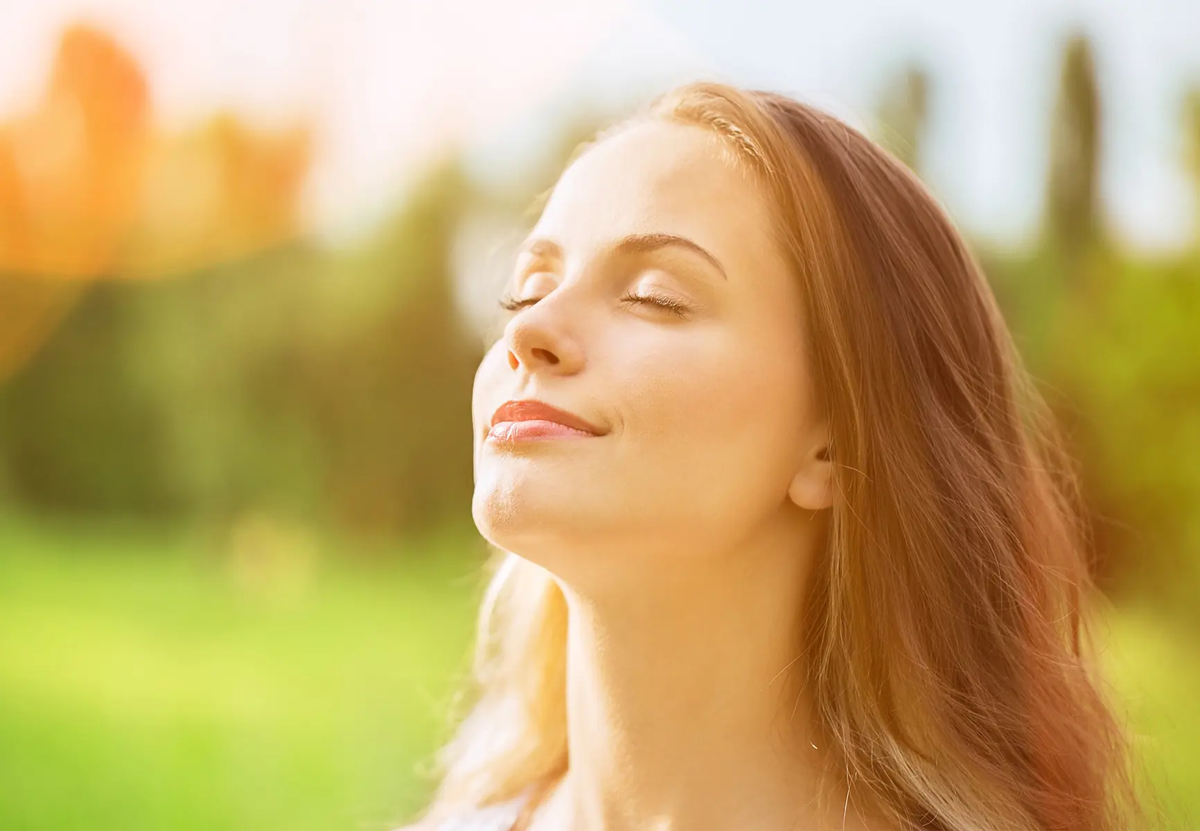 Woman breathing in through her nose