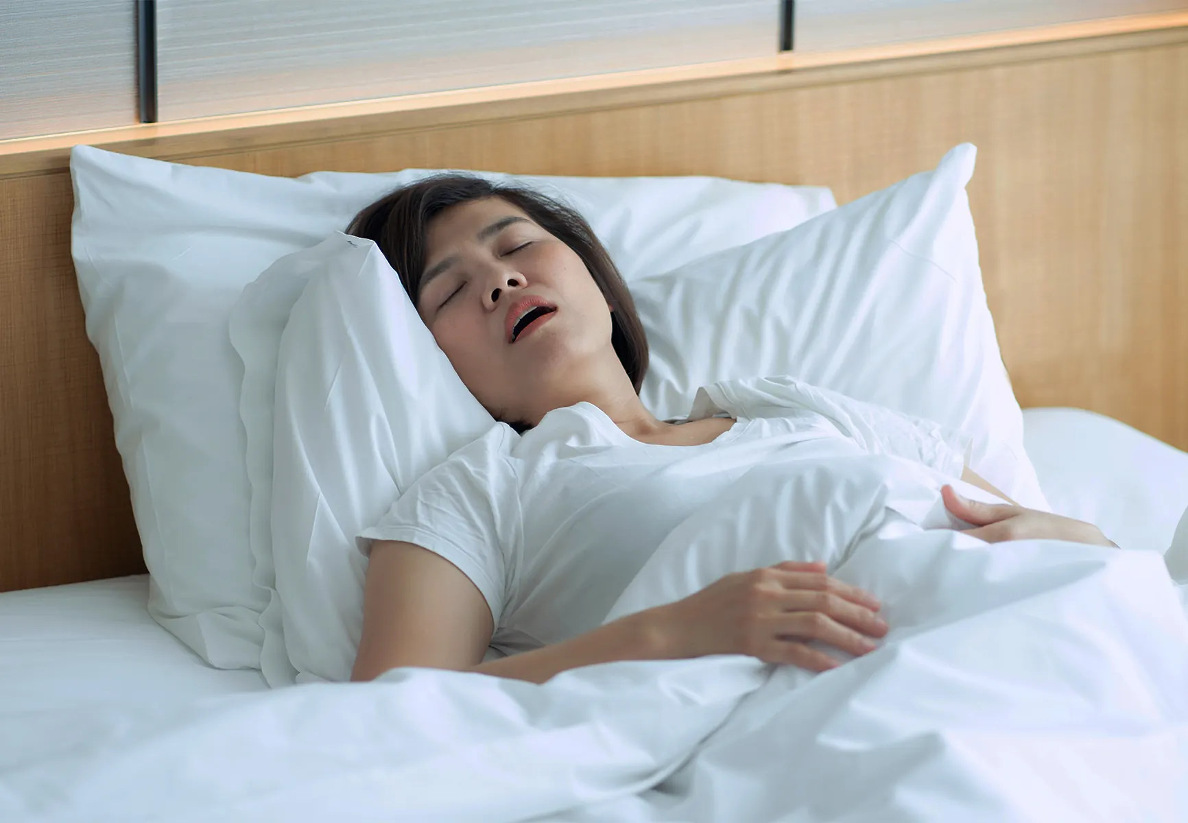 Asian woman sleeping with mouth open