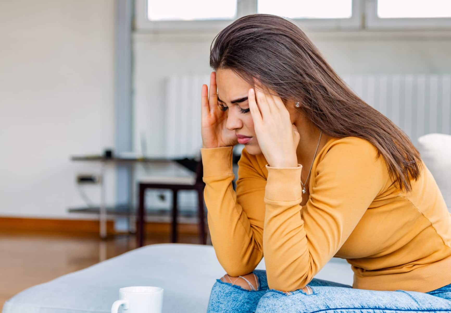 young woman with a sinus headache