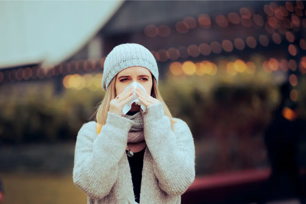 Woman Blowing her Nose